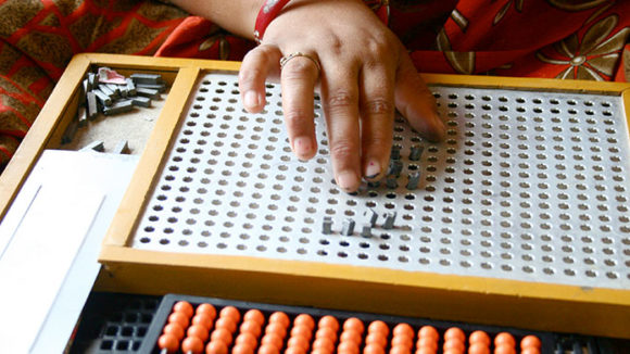 Picture of Braille being taught