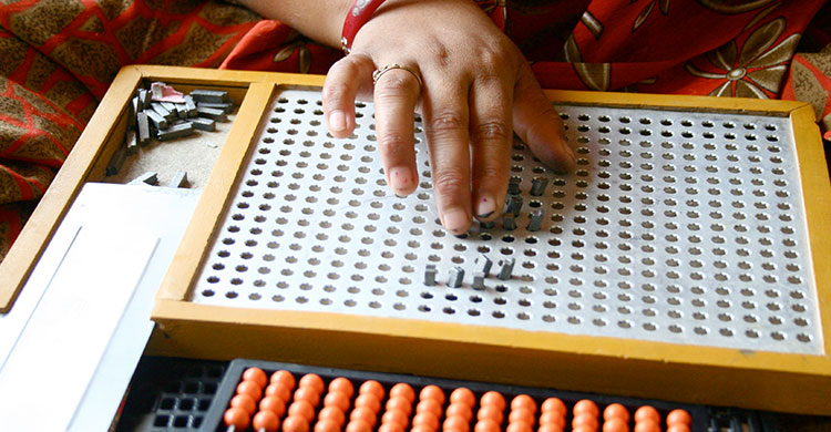 Picture of Braille being taught