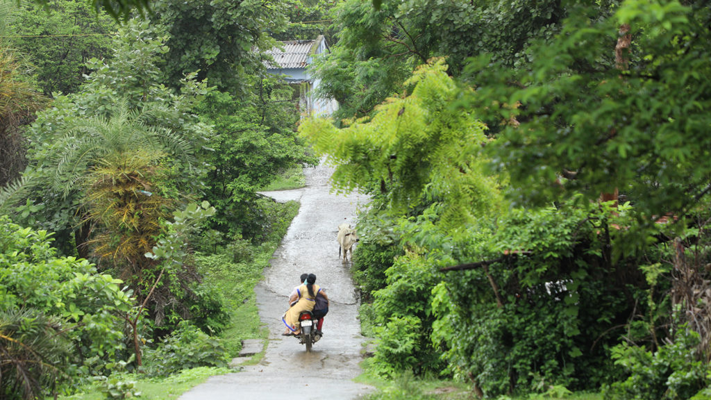 People riding a motorbike in Madhya Pradesh.