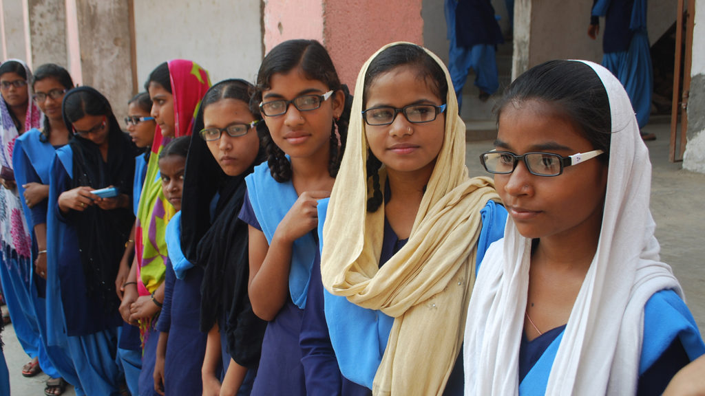 Students with their glasses for the first time.